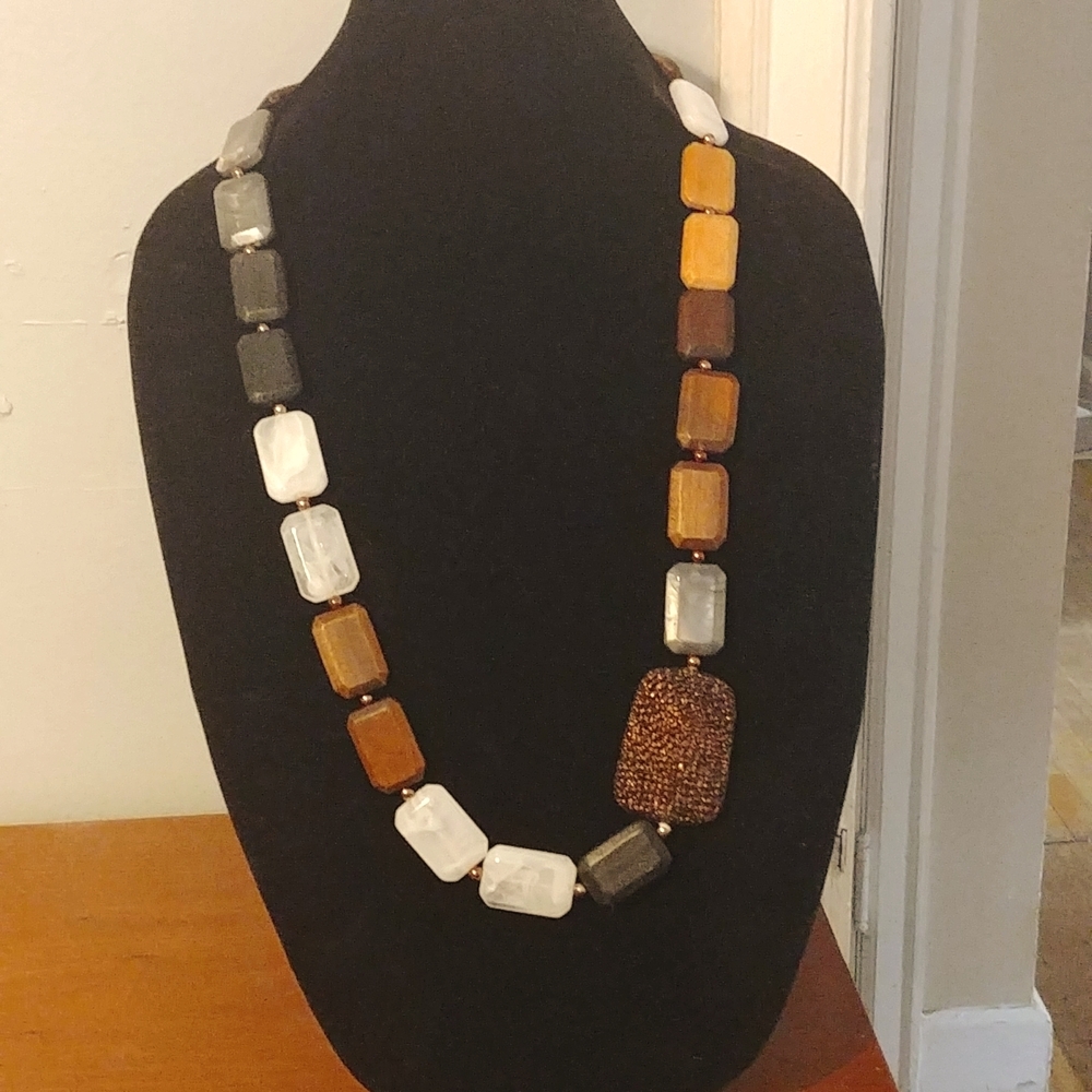 Multiple media 32-in necklace with a 4 inch extender.